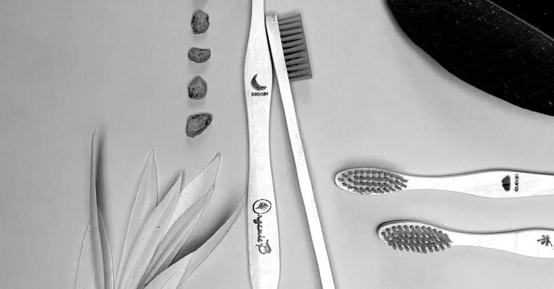 Toothbrushes and dental care products laid out for oral hygiene education